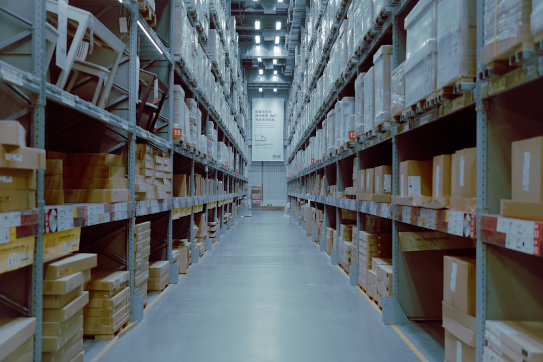 Interior of a large modern distribution warehouse with high racking