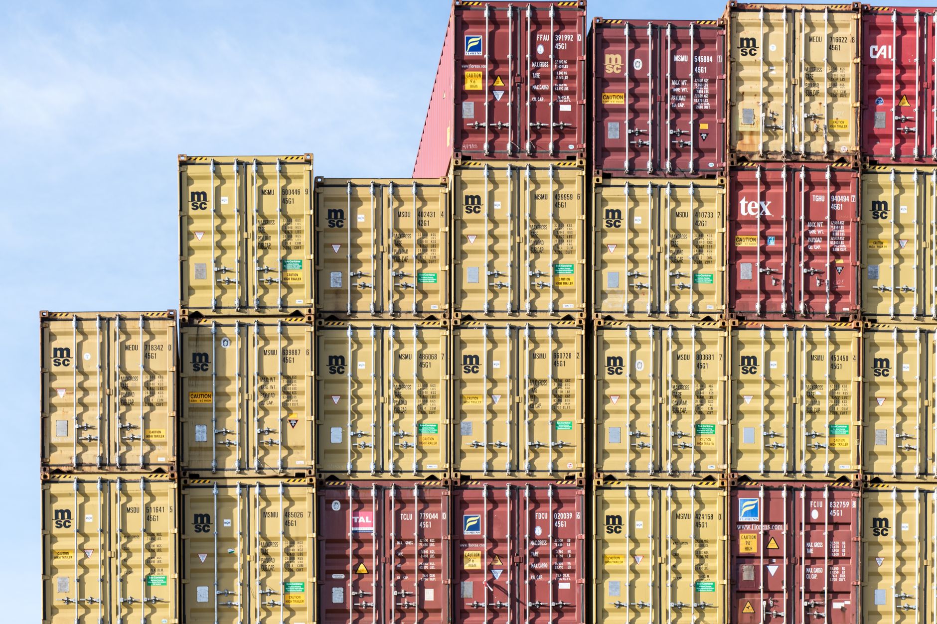 Stacked shipping containers marked for export