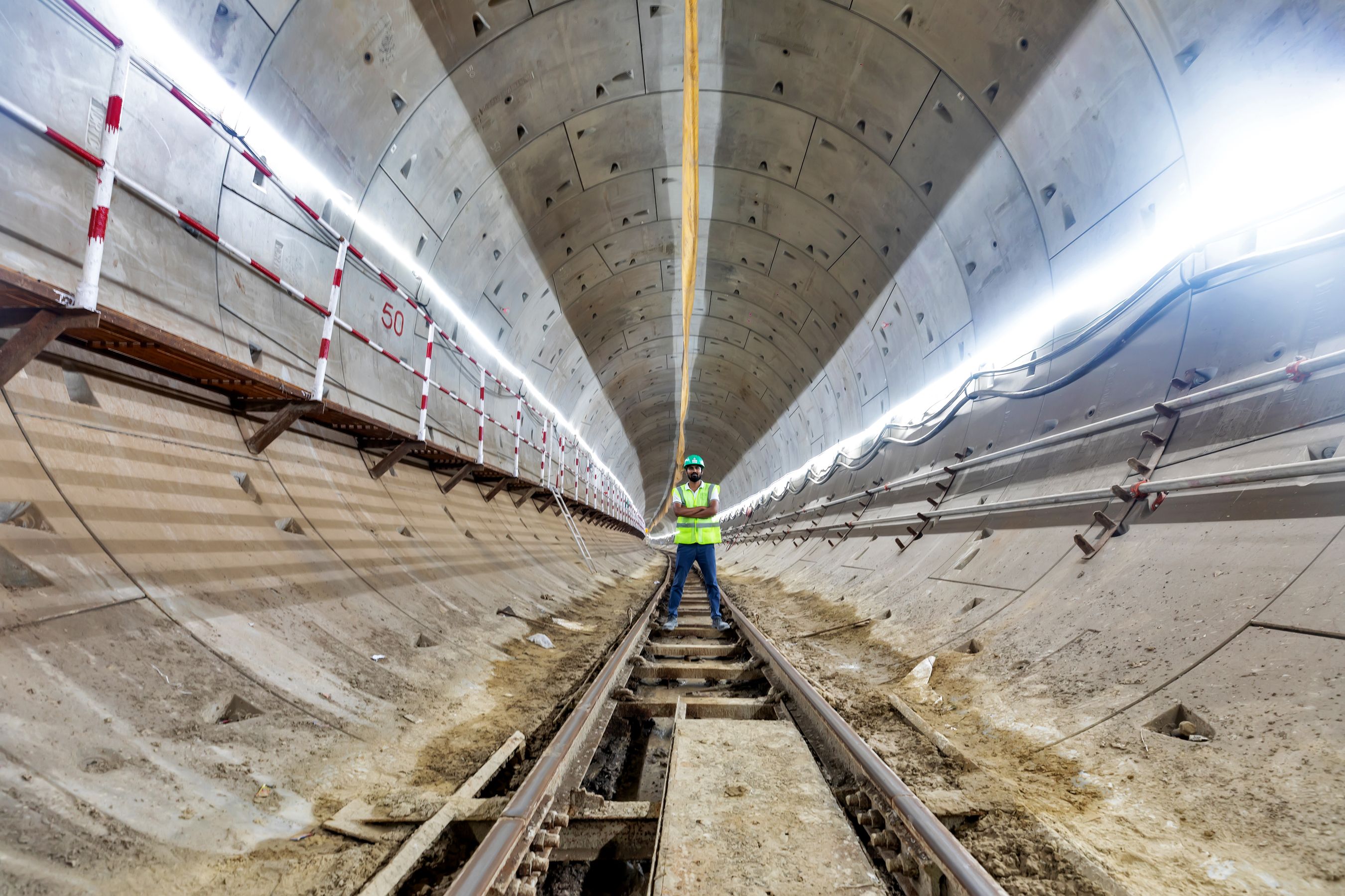 Freight rail construction through mountainous Central Asian terrain