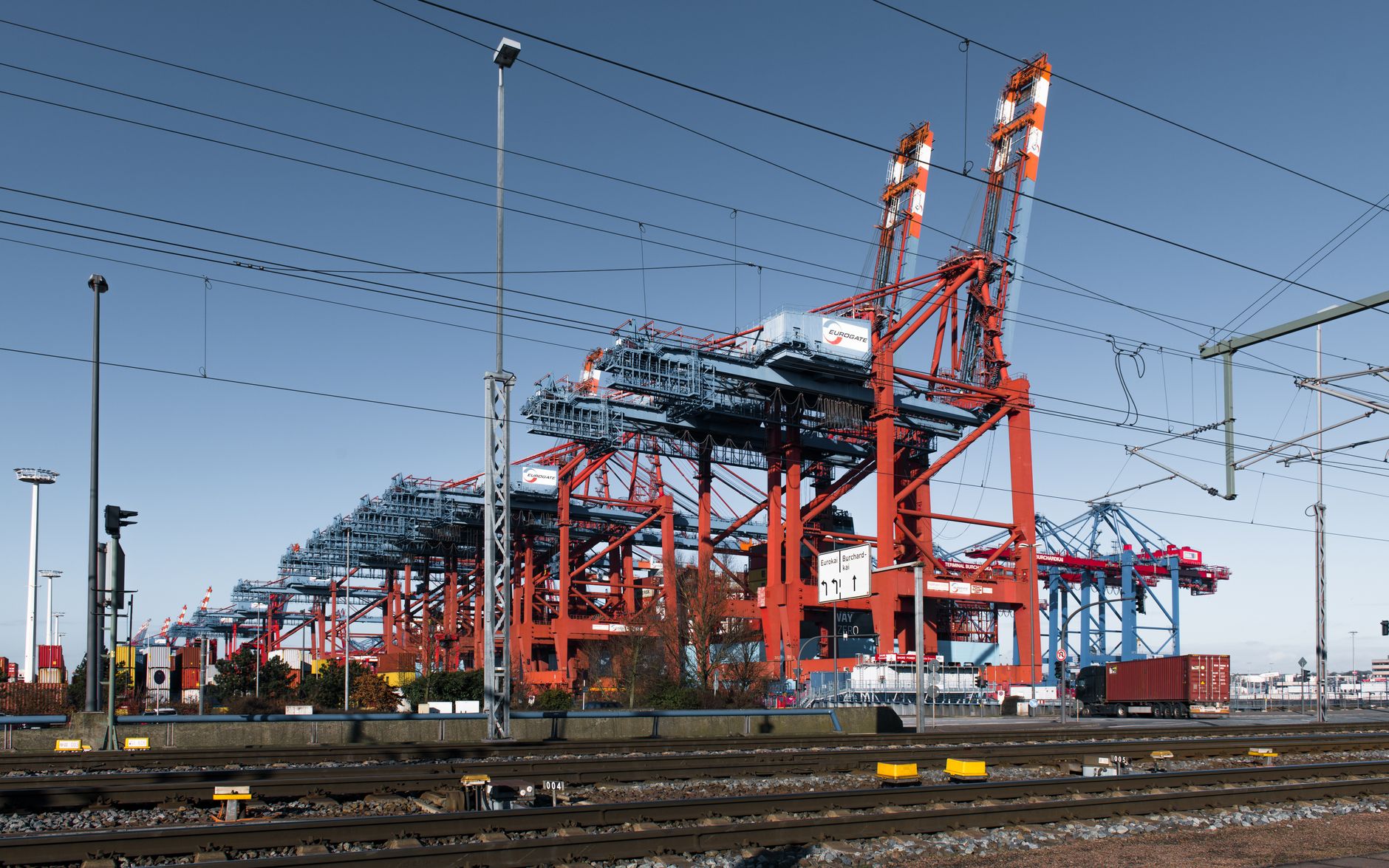 Container ship being loaded at a port terminal