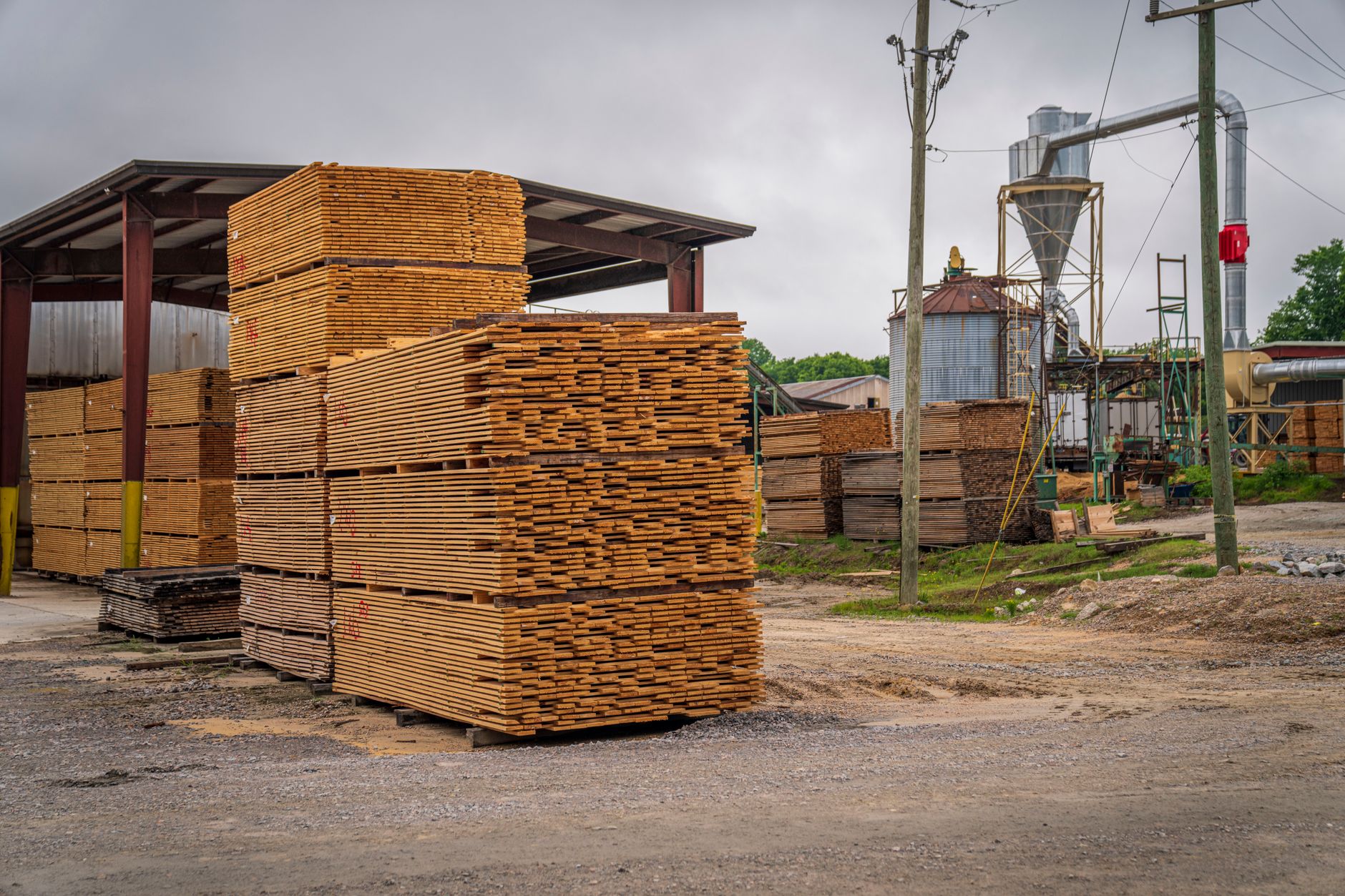 Stacks of sawn timber at a lumber yard, the raw wood that ISPM-15 requires be heat-treated