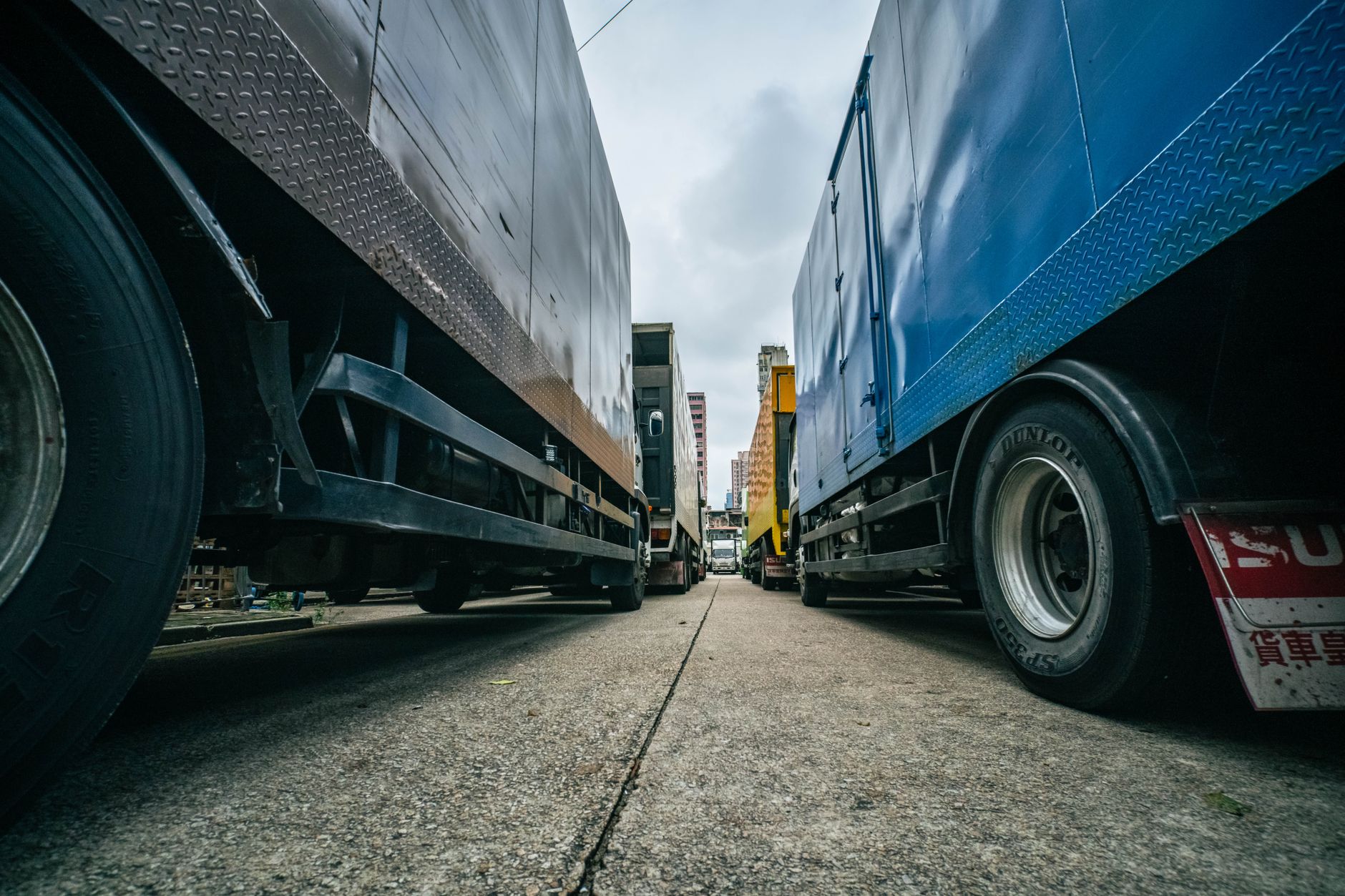 Container trucks queued outside a congested Red Sea port terminal