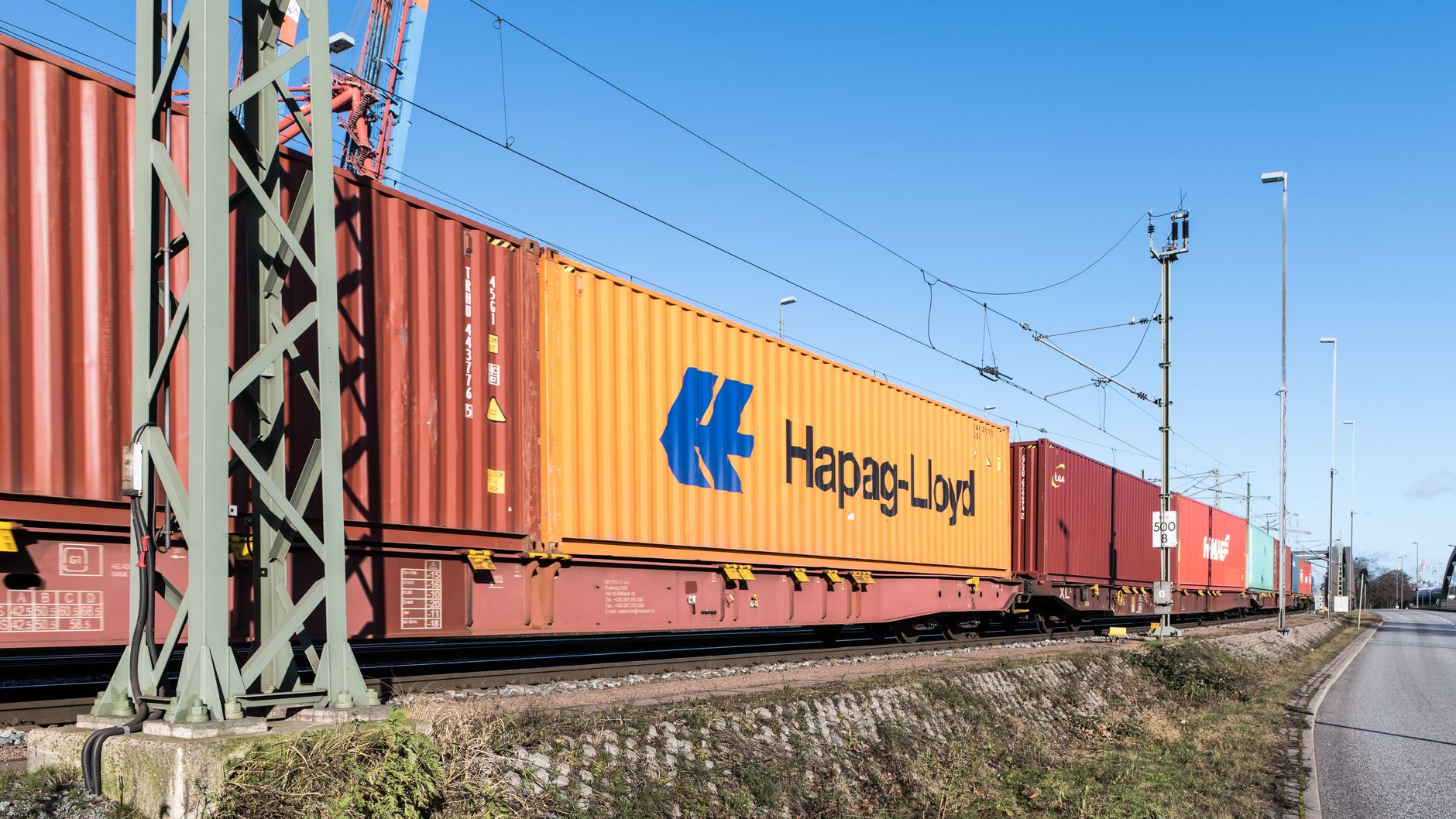 Container freight train on a rail corridor