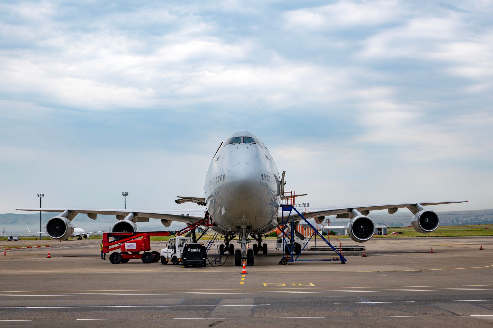 Wide-body freighter aircraft of a major cargo airline on the apron