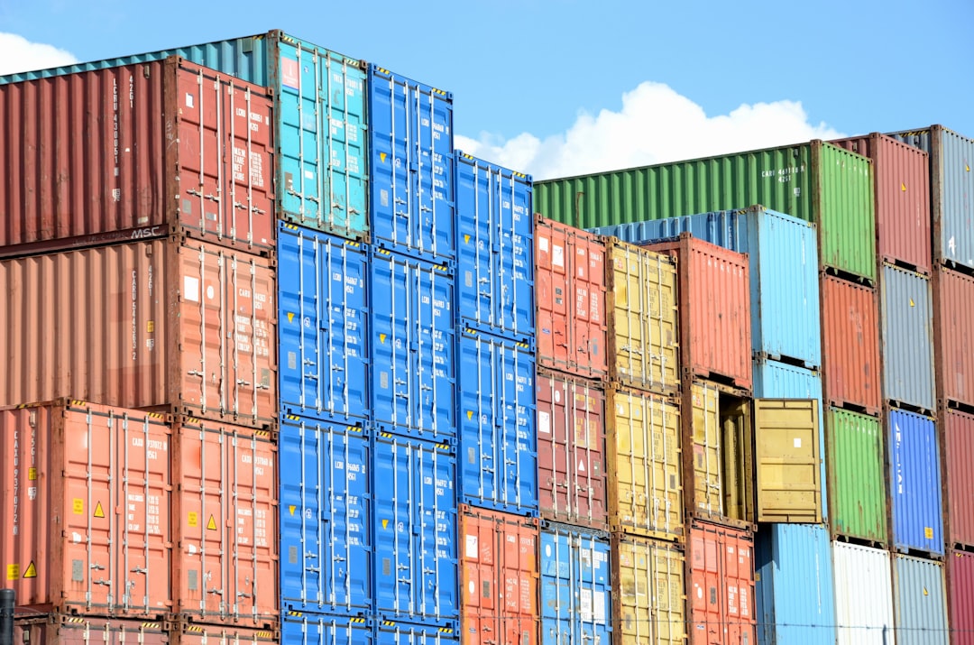 Wall of stacked intermodal containers in a container yard