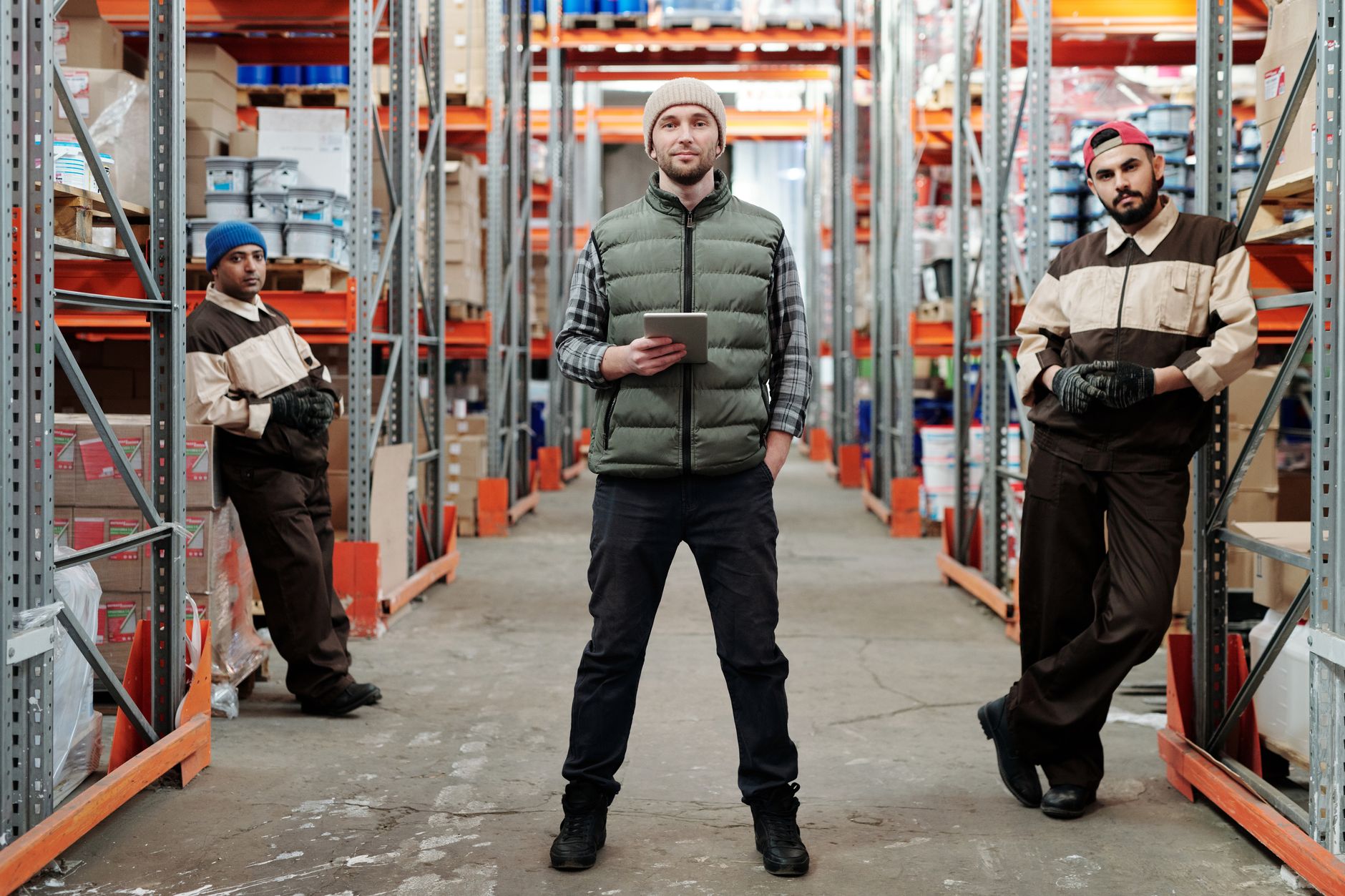 Logistics worker with a tablet in a warehouse