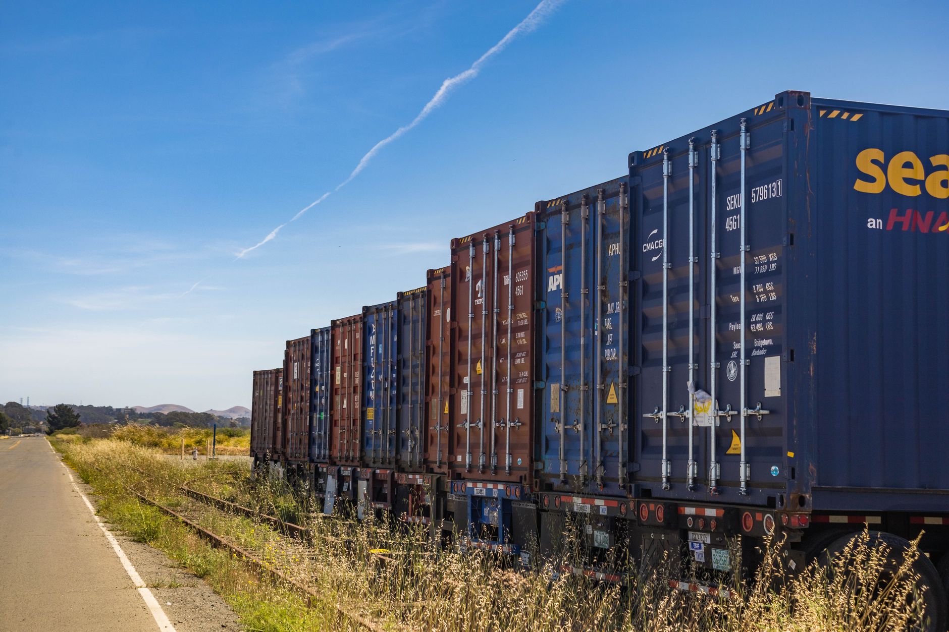 Intermodal shipping containers on a rail siding, a land-bridge alternative to the canal