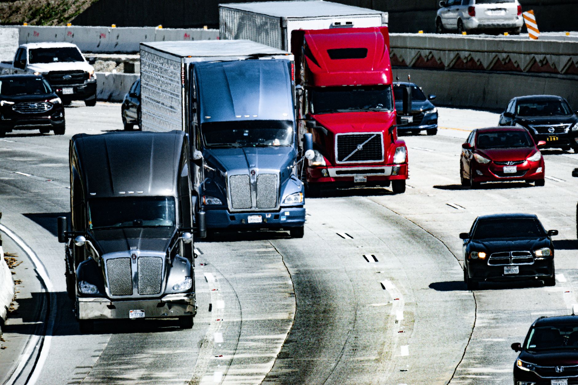 Cargo trucks on a highway freight corridor